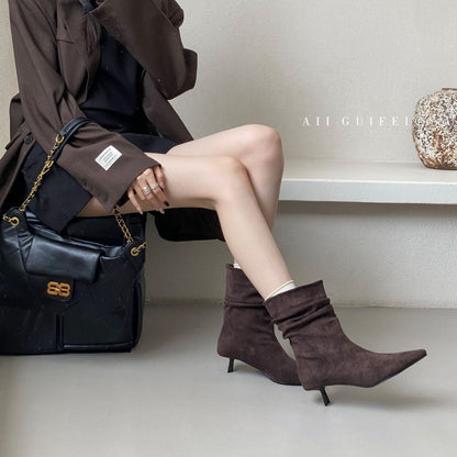 Elegante stilettostøvler i skind med frynser